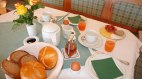 Frühstück - schön gedeckter Tisch, © Gästehaus Elfriede - Ofterschwang