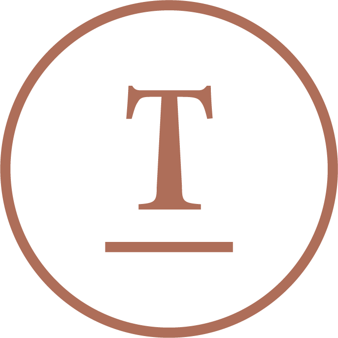 Logo des Day Spa im Torghele's Hotelerei. Orangefarbener Kreis auf grauem Grund. Darin ein großes, orangefarbenes "T".