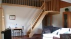 Wohnzimmer mit Treppe, © Ferienwohnung Fröhlich - Ofterschwang